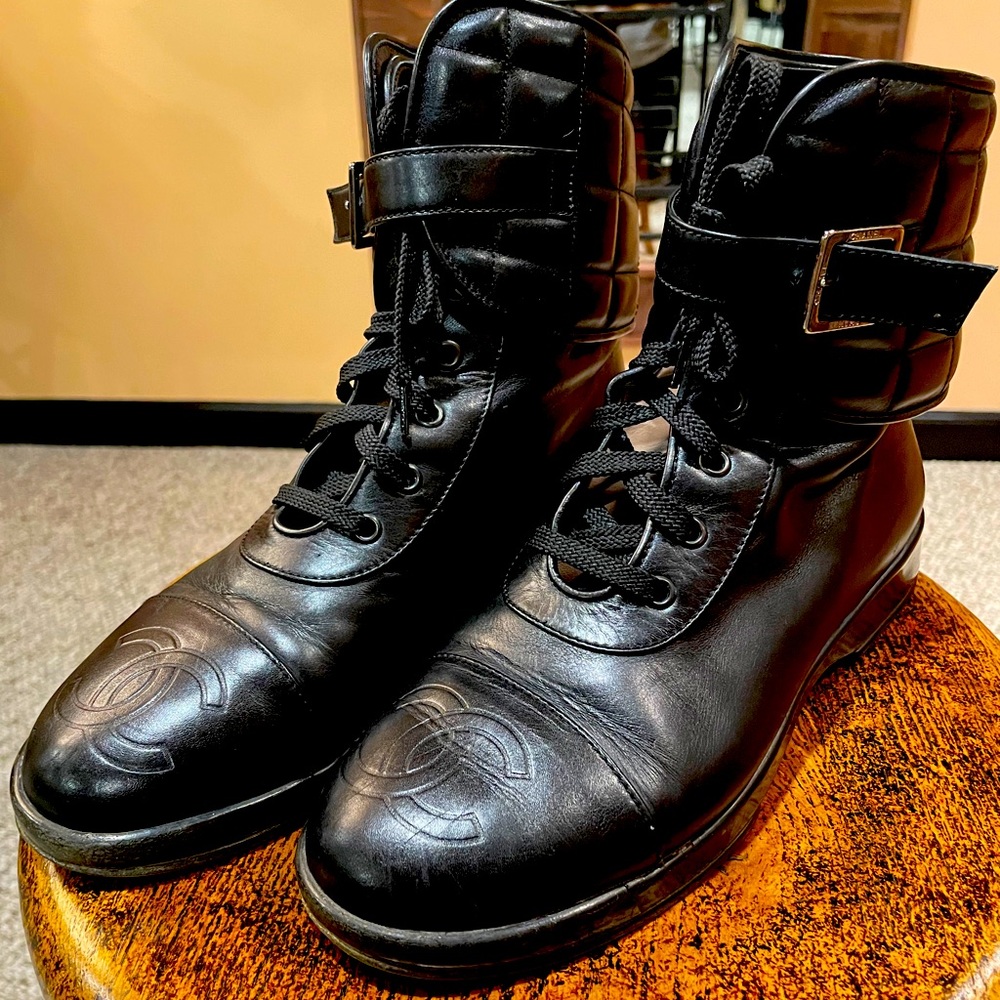 Black CHANEL leather boots.